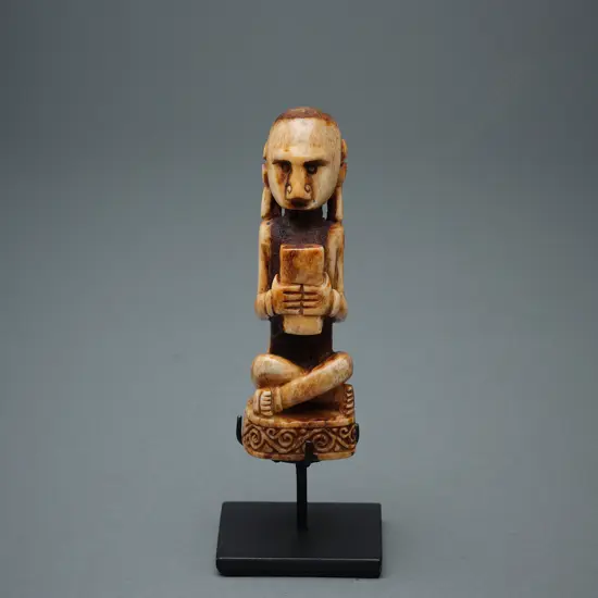 Indonesian bone male figure,